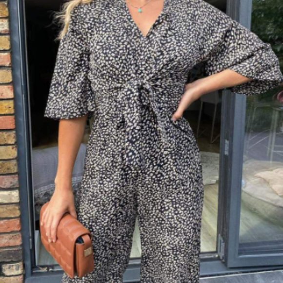 SOLD AX Paris_ WOMEN'S BLACK AZTEC Front Tie JUMPSUIT SZ 8 - Picture 1 of 4